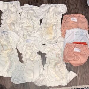 Lot of size 1 Esembly diapers 6 diapers and 3 shells